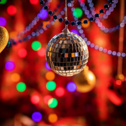 Close-up of a Mini Mirror Disco Ball Reflecting Glittering Light